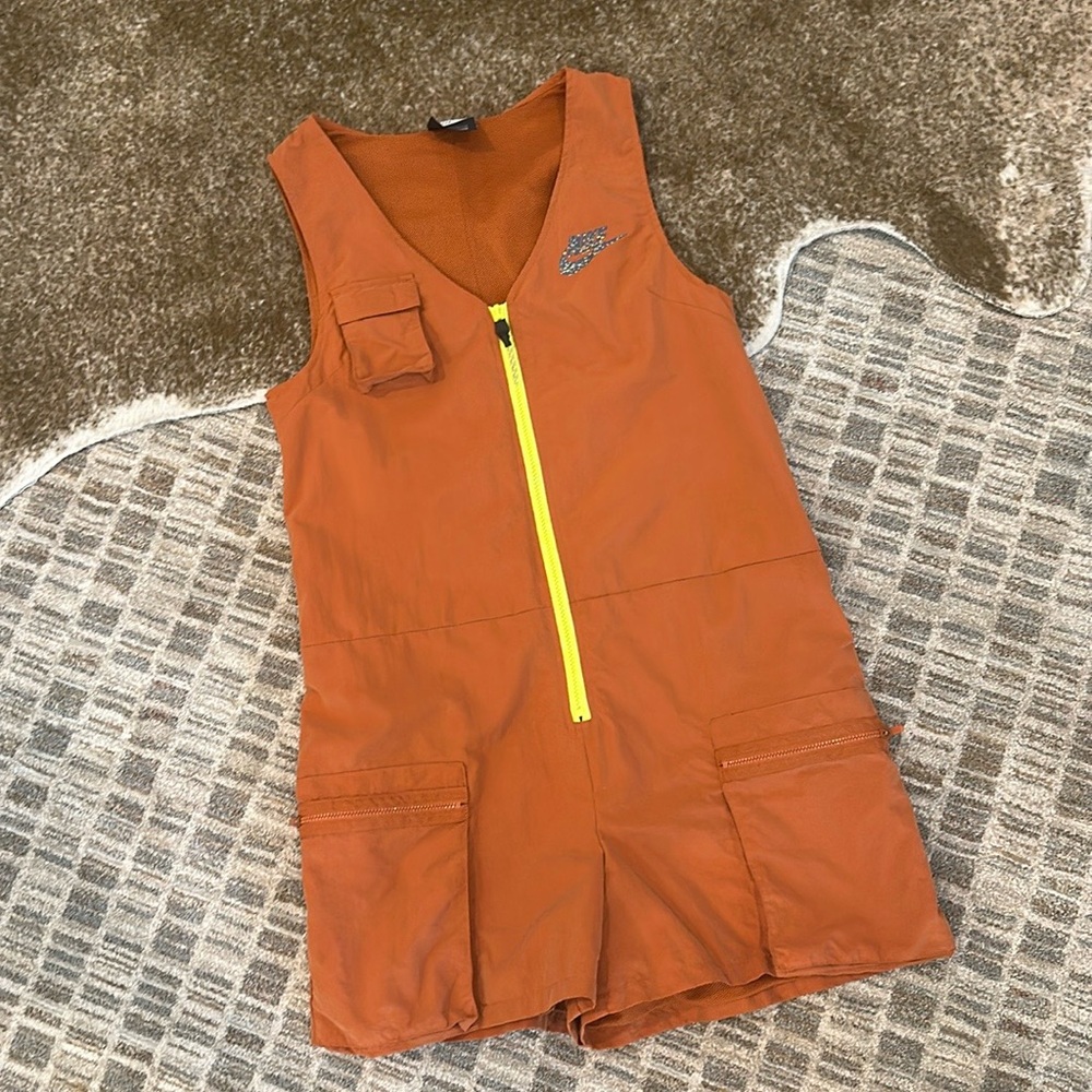 Nike Womens Size Small Sportswear Icon Clash Romper Desert Orange Lemon Venom